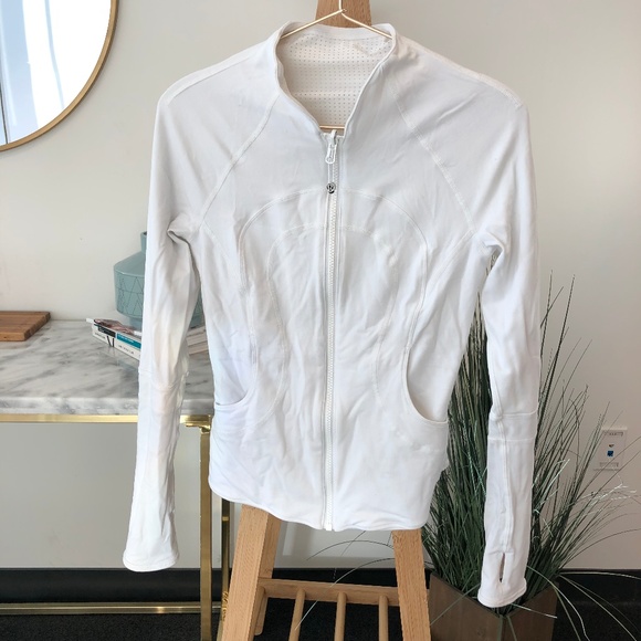 white hoodless jacket